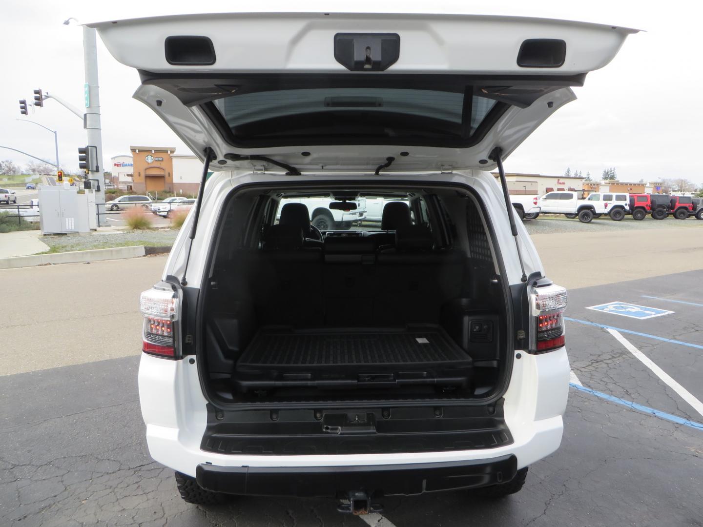 2019 White /BLACK Toyota 4Runner TRD Pro (JTEBU5JR3K5) with an 4.0L V6 engine, 5 -Speed Automatic transmission, located at 2630 Grass Valley Highway, Auburn, CA, 95603, (530) 508-5100, 38.937893, -121.095482 - Features Ironman 4X4 suspension, BFG tires, Rockslider, Roof rack, window tint, and interior Rago Fab Molle storage racks. - Photo#53